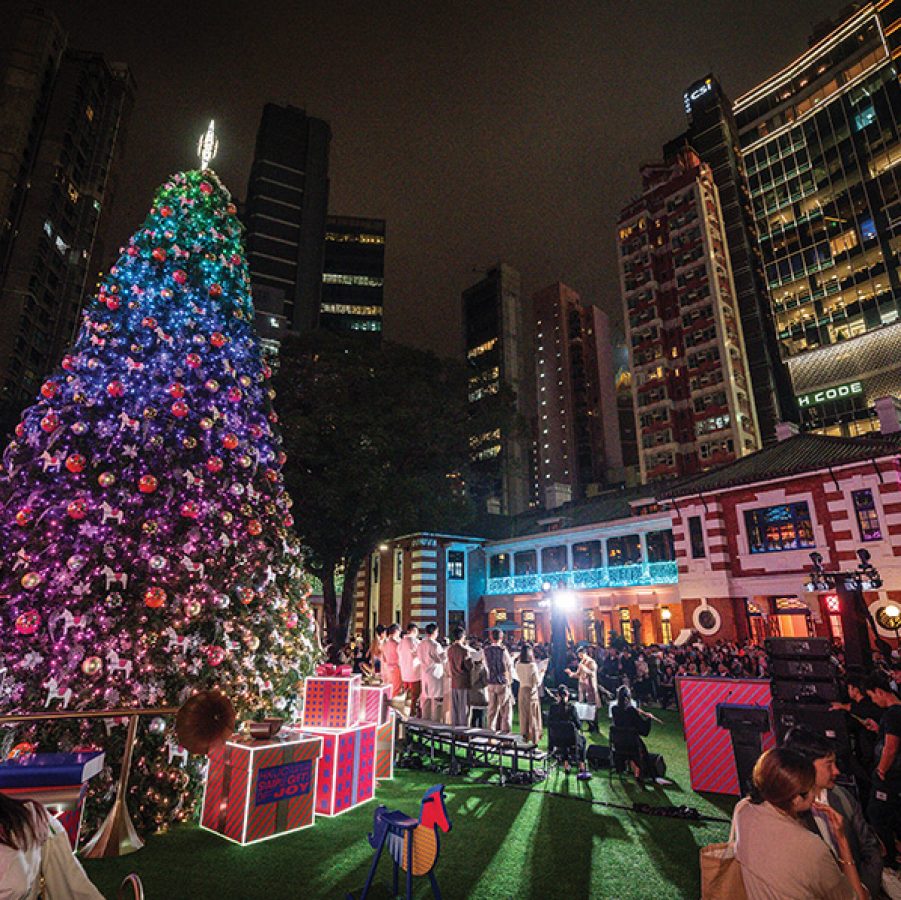 A tall Christmas tree, decoration and light show at Tai Kwun in Central.