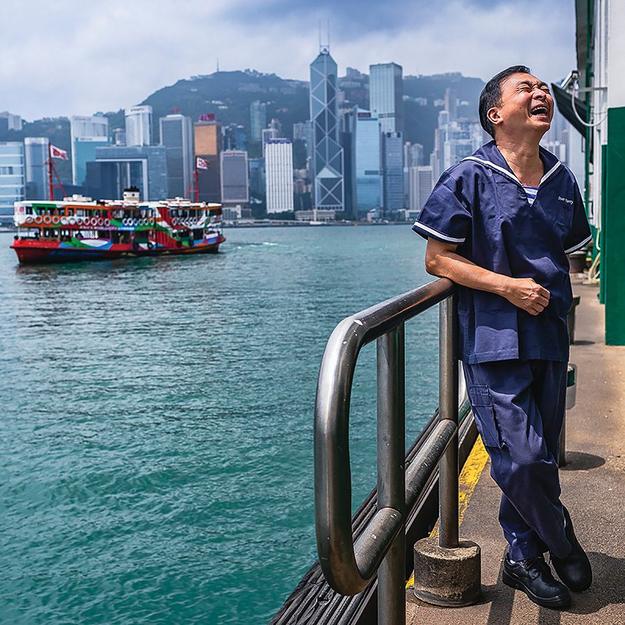 Portrait of a Star Ferry sailor at the Tsim Sha Tsui pier. 