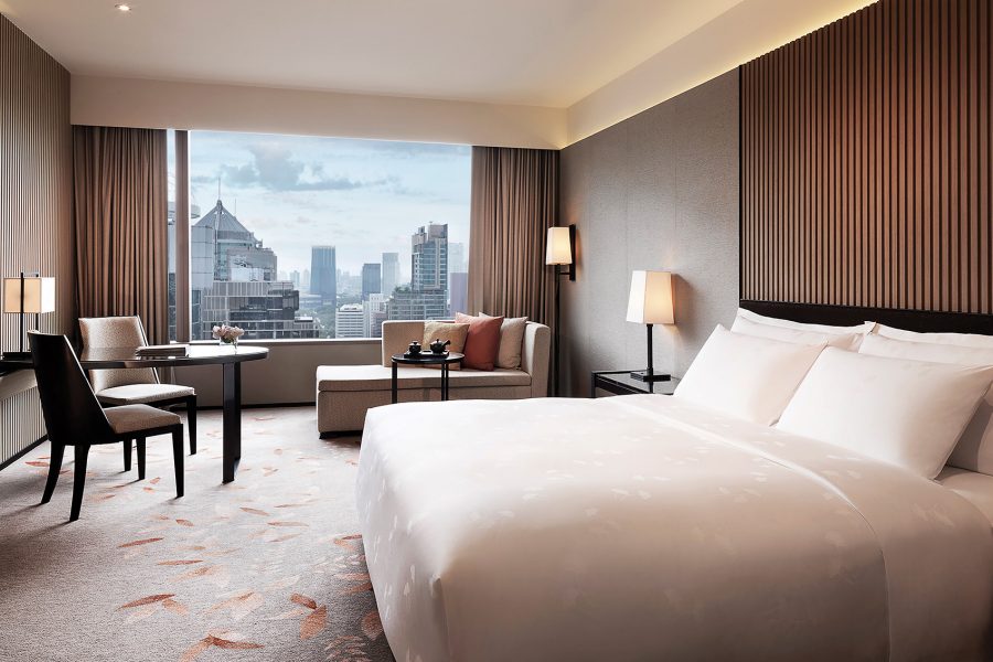 A view of Bangkok cityscape from inside a guestroom at The Okura Prestige Bangkok at daytime