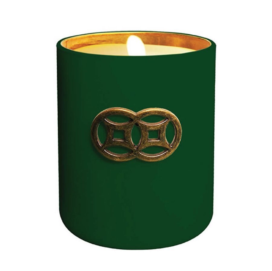Close up shot of the G.O.D.  Green Forest double coin jar candle.