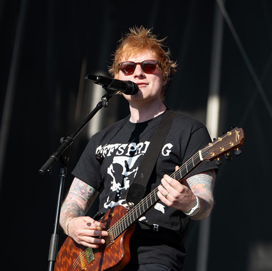 Singer Ed Sheeran wearing sunglasses as he performs  