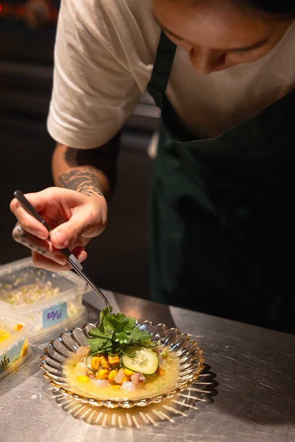 Chef plating a dish at Bourke’s.