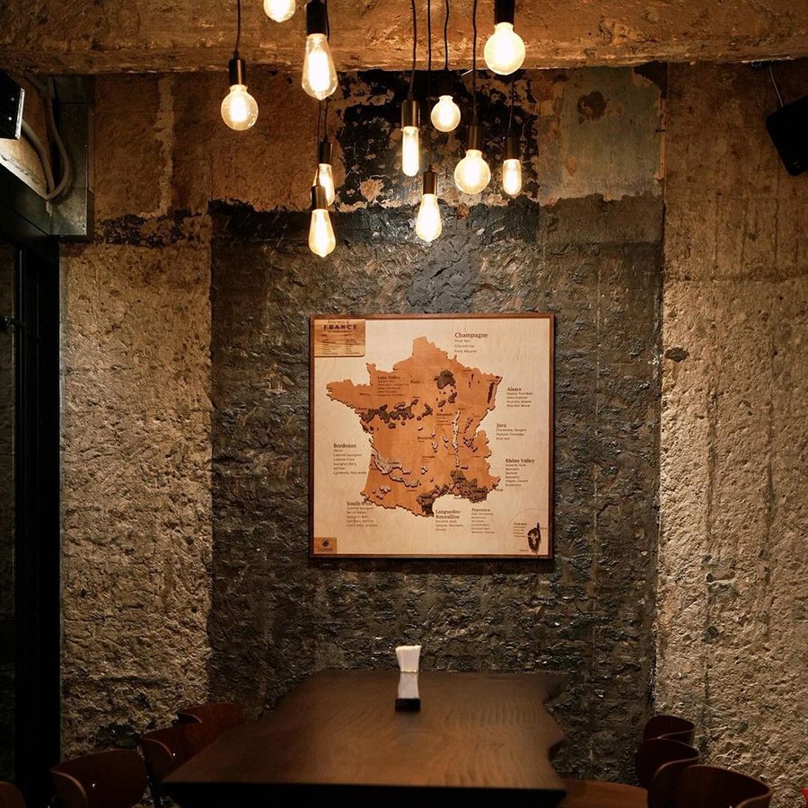 Shot of a table and picture at Corks.