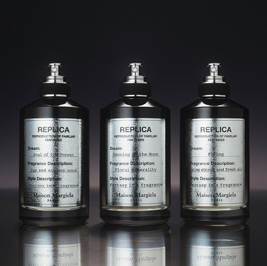 Three black and silver spritz bottle of Maison Margiela ’s Replica eau de parfum series.