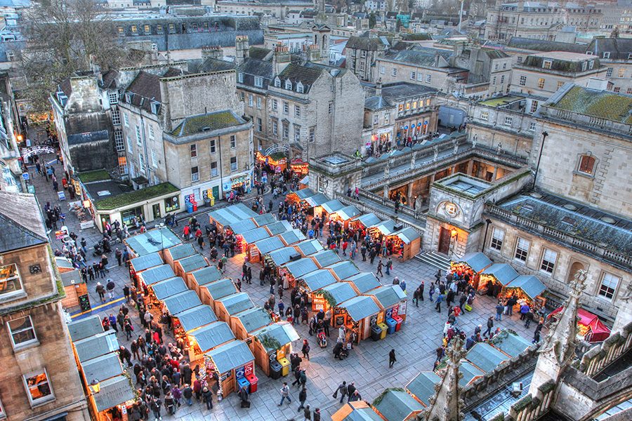 An aerial view of people at a Christmas Market in Bath, United Kingdom.