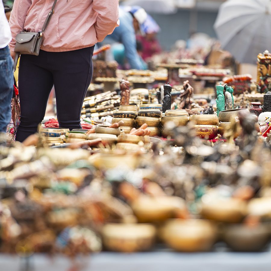 Singing bowls and other souvenirs at a market stall in Kathmandu.