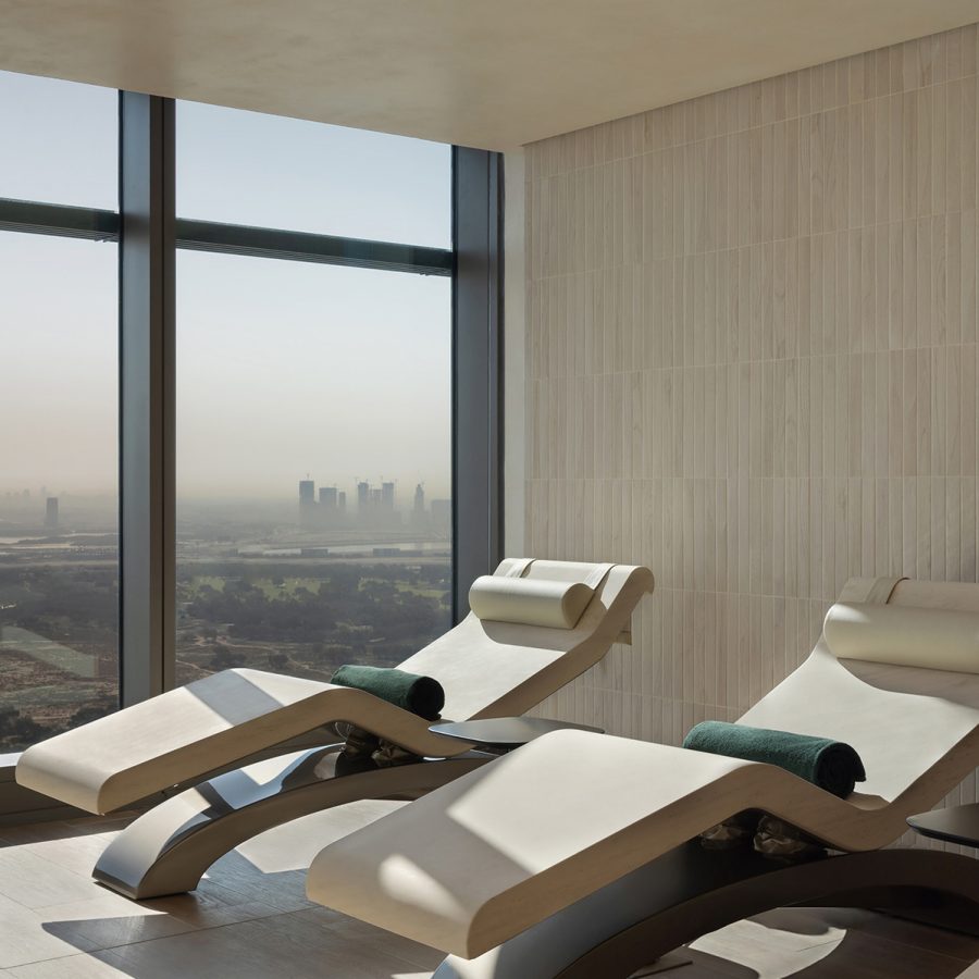 Interior of an indoor treatment room at Siro One Za’abeel featuring lounge chairs in the sun. 