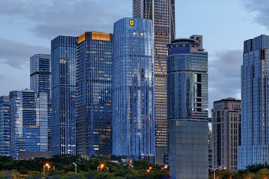 A view of Futian district in the evening and exterior of Shangri-La Shenzhen in China.