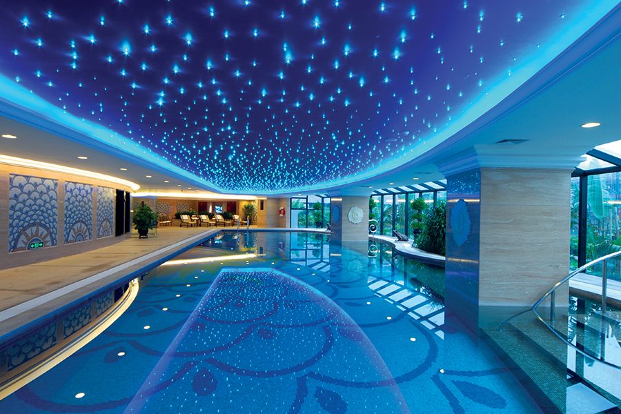 A view inside the indoor swimming pool with illuminated ceiling at Kempinski Hotel Shenzhen in China.