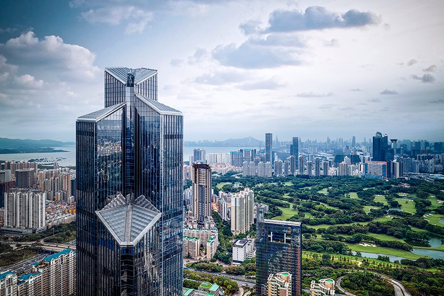 A bird’s eye view of Shenzen cityscape during daytime and exterior view of Park Hyatt Shenzhen in China.