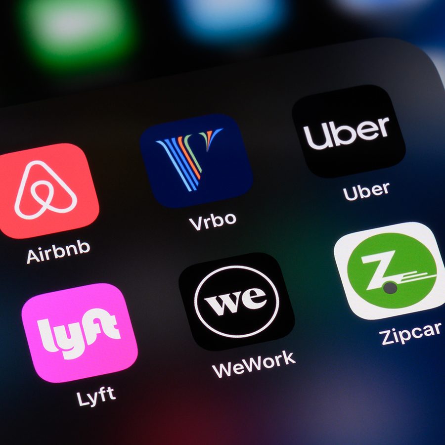 Rideshare apps like Uber or Lyft, which are preferable to public transport in Dallas-Fort Worth, are shown on a phone screen.