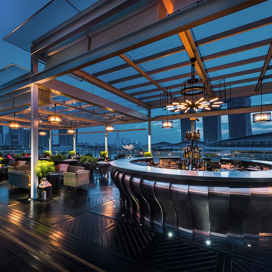 Lantern’s stylish bar, standing on the eighth floor of The Fullerton Hotel Singapore, is illuminated in the evening.