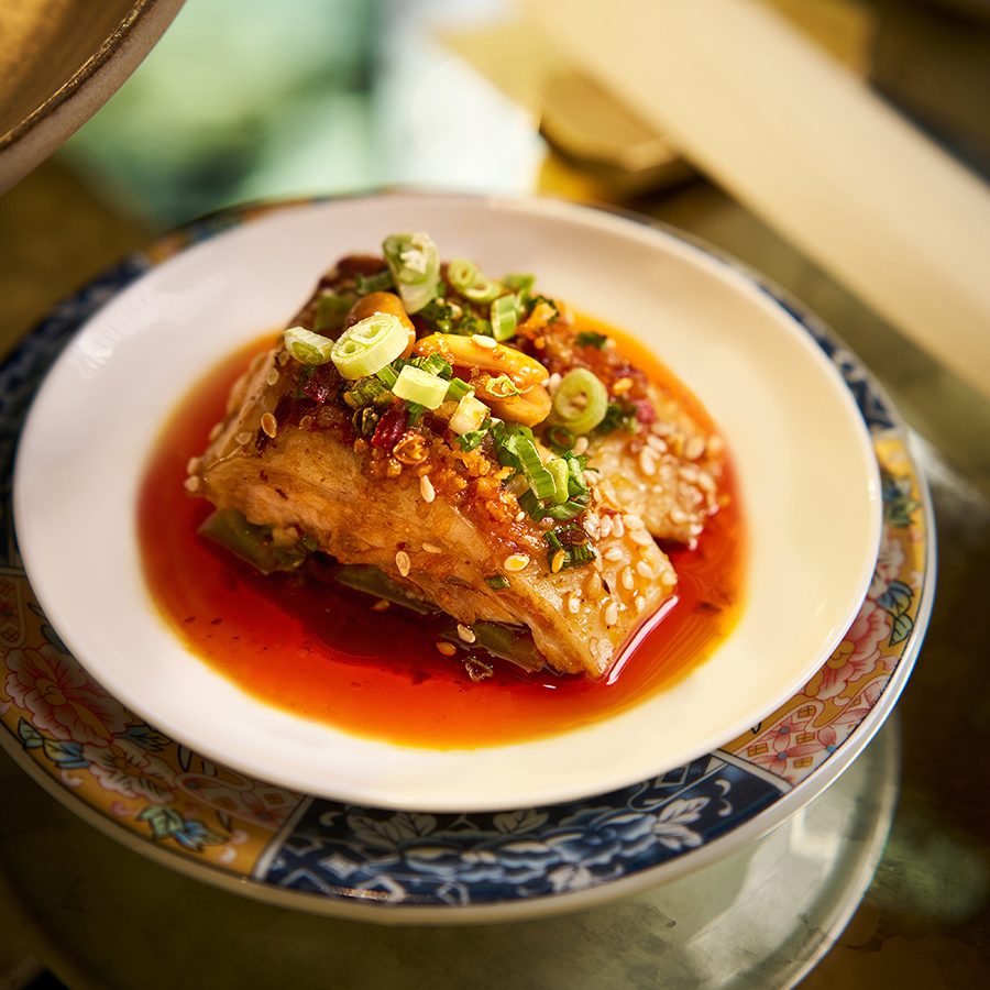 Chilled chicken with Sichuan peppercorn and chili sauce by Mott 32 for Cathay. 