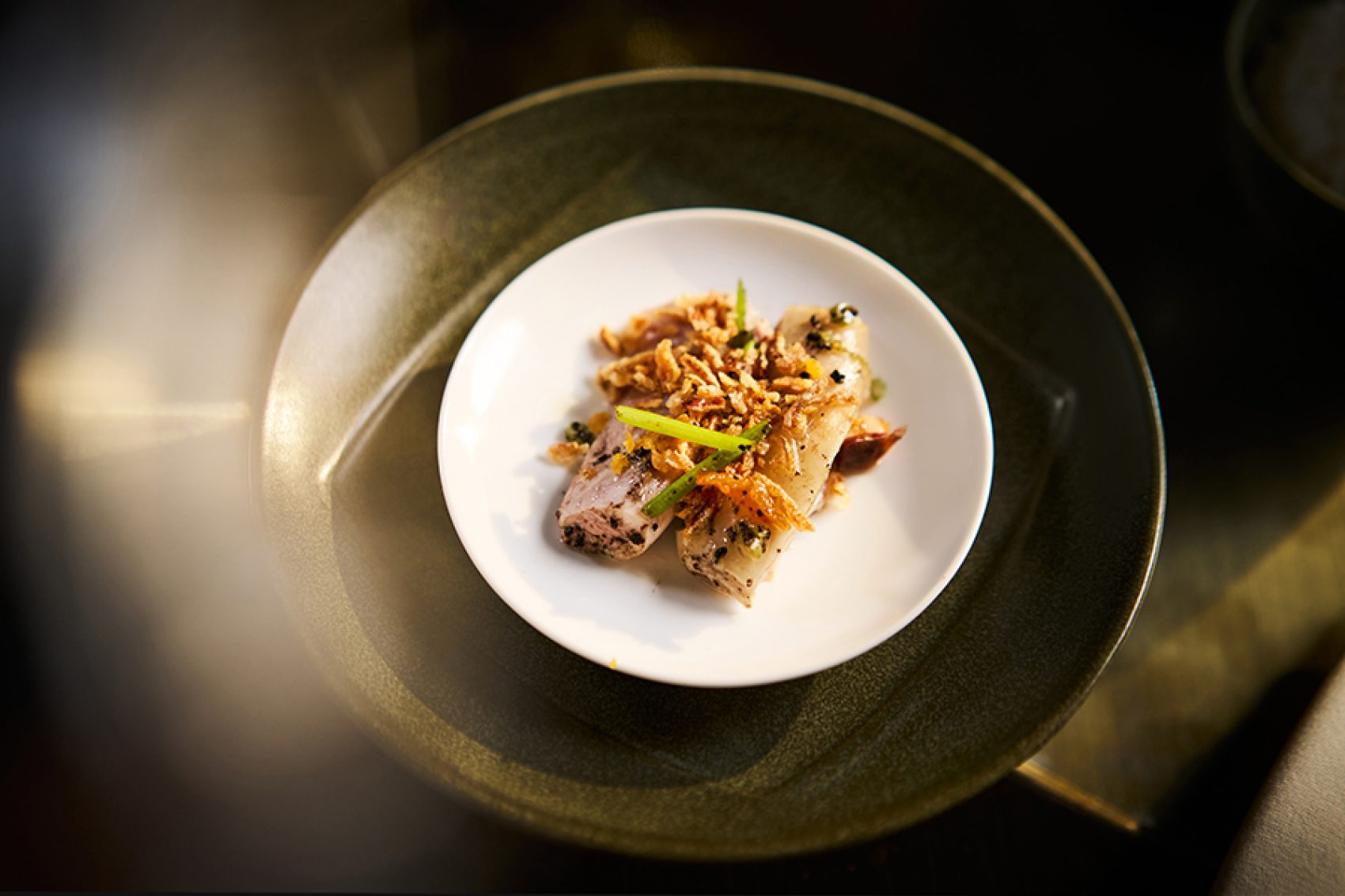 Cold chicken with coriander and black truffle by Mott 32 for Cathay.