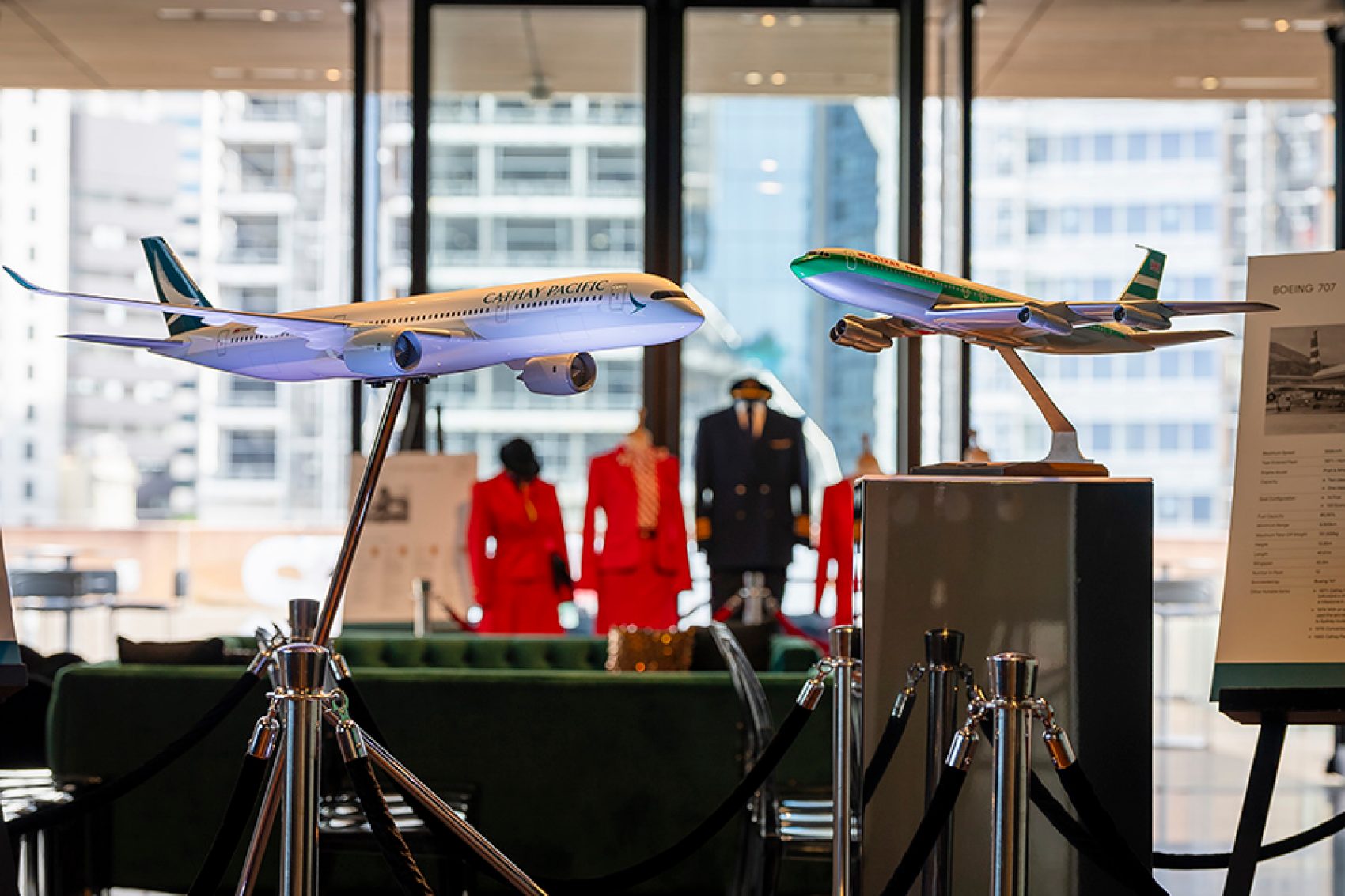 Two model aircraft and a display of cabin crew uniforms at the Museum of Contemporary Art Australia in Sydney. 