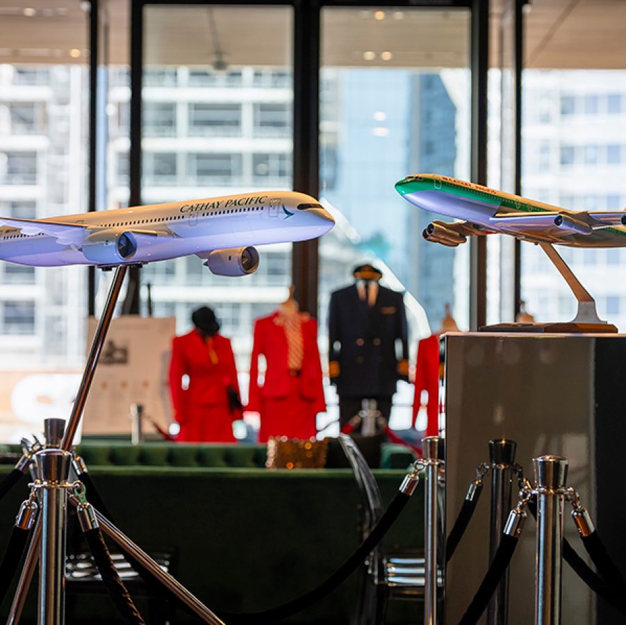 Two model aircraft and a display of cabin crew uniforms at the Museum of Contemporary Art Australia in Sydney. 
