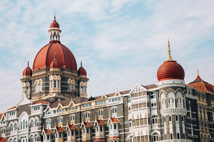 An exterior view of Taj Mahal Palace Hotel in Mumbai during daytime.