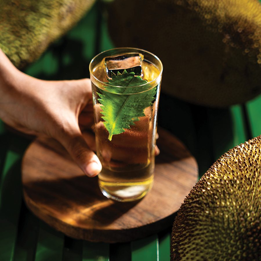 A close-up of a glass of durian Jack is back cocktail, served at Bawri in Mumbai