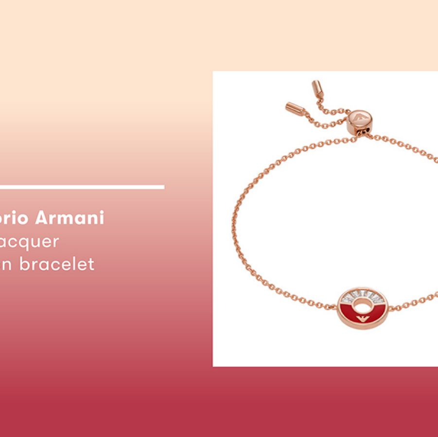 Product shot of Emporio Armani’s red lacquer station bracelet.