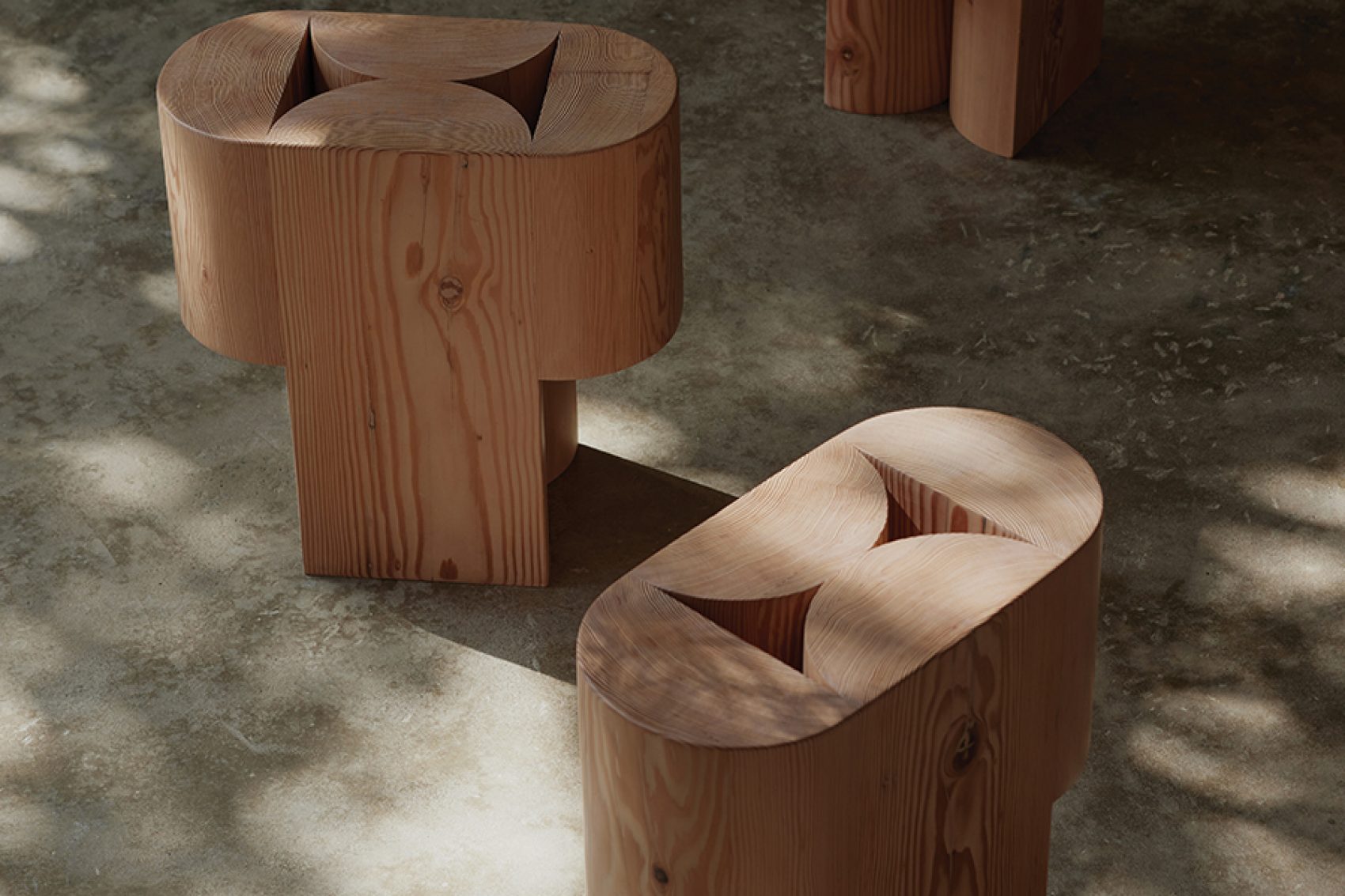 "Arc table/stool" crafted from solid recycled Oregon timber by Adam Goodrum.