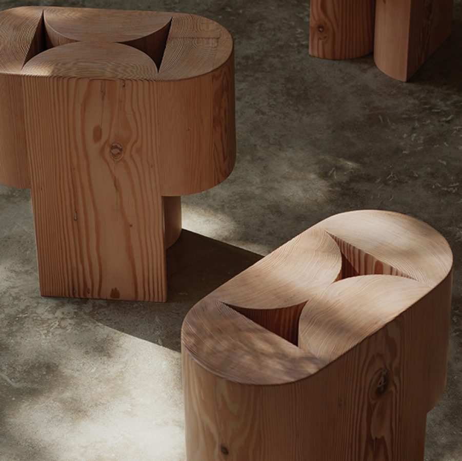 "Arc table/stool" crafted from solid recycled Oregon timber by Adam Goodrum.