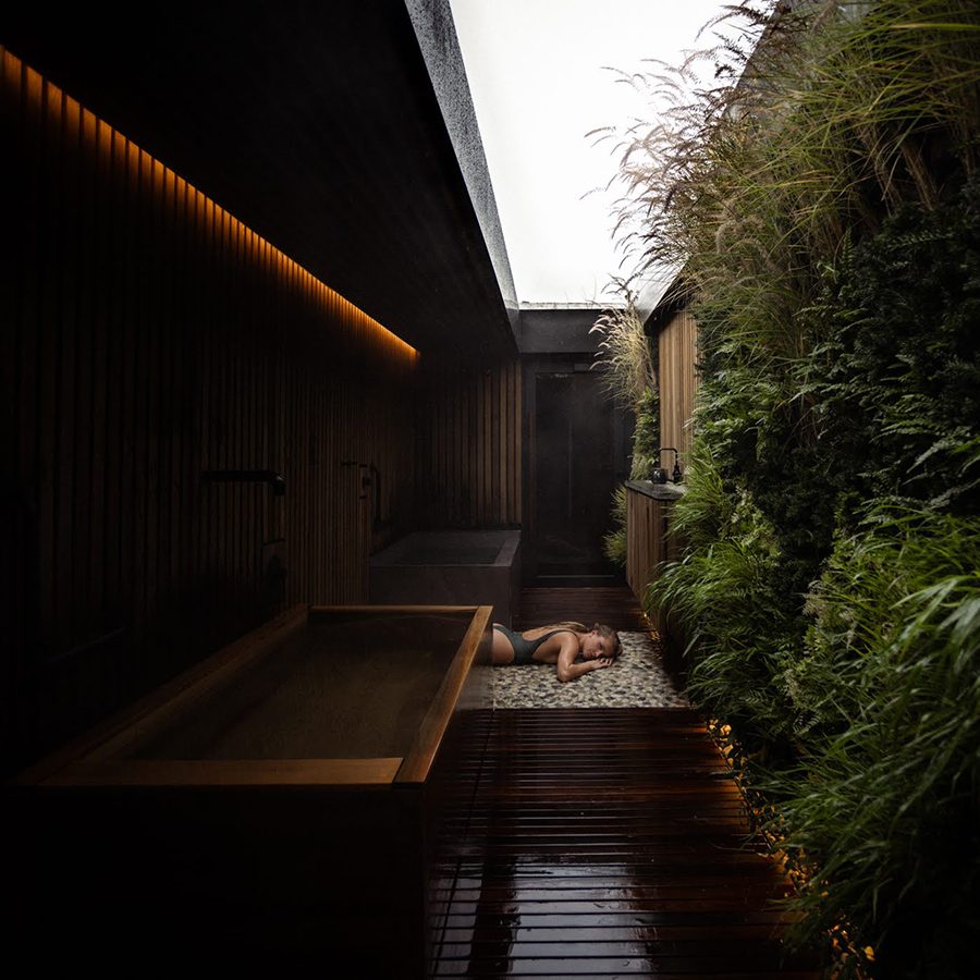 A woman lies on the floor of Circle Wellness on Granville Island, British Columbia. 