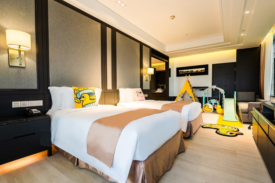 An interior shot of a double bed in the hotel bedroom of Crowne Plaza Shanghai Anting.