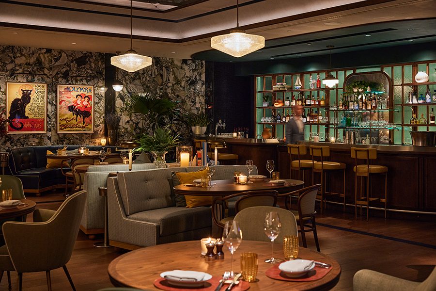 An interior view of Marmo Bistro in Rosewood Hong Kong, featuring classic French decor and interior design. 