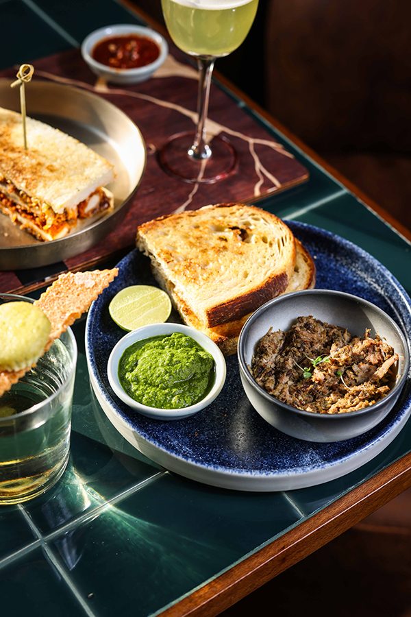 A group shot of various dishes and cocktails, served at Bar Kin-Rü in Hyderabad