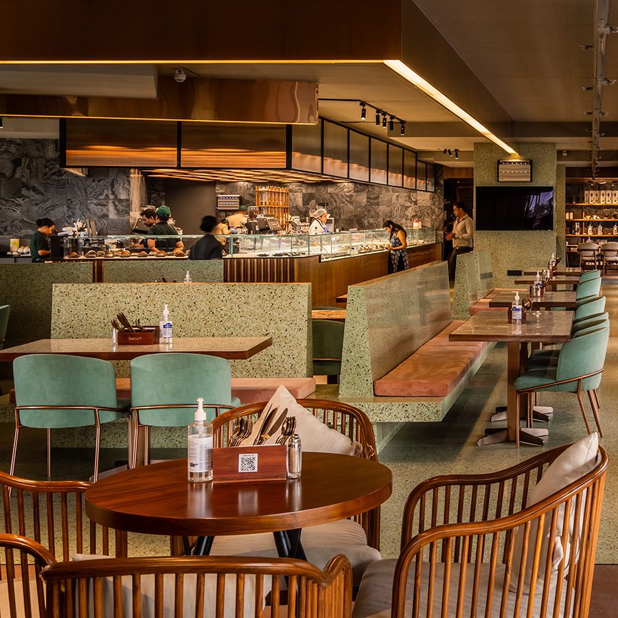  An interior view of the indoor seating area at coffee shop Roast CCx in Hyderabad