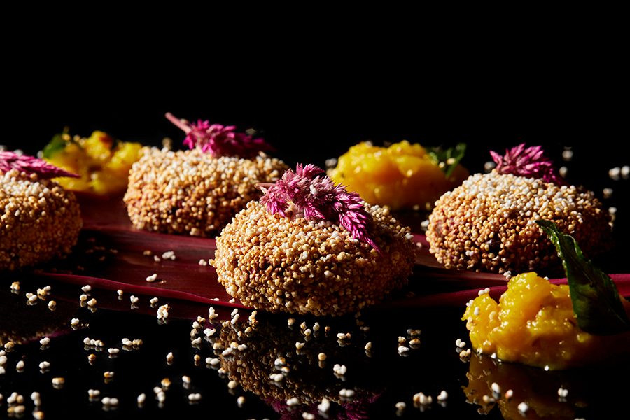 A close-up of four multigrain vegetarian cutlet and raw mango relish, served at Terrai neo-telangana kitchen and bar in Hyderabad