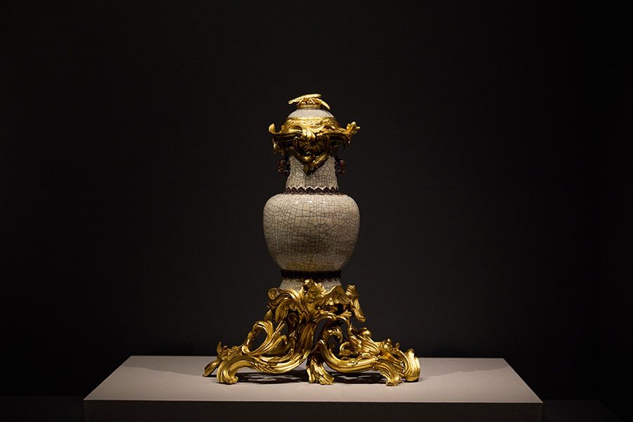 Golden statue at The Forbidden City and The Palace of Versailles: China-France Cultural Encounter.