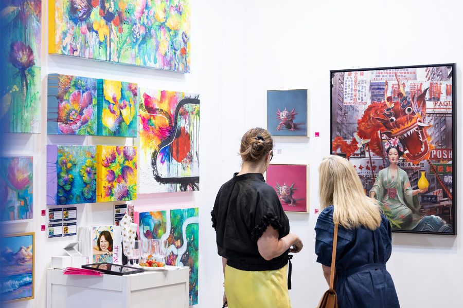 Visitors admiring artworks at the Affordable Art Fair in Hong Kong.