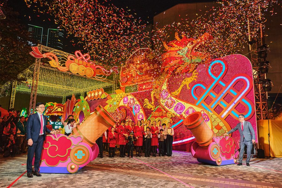 Confetti raining down on a parade during Chinese New Year in Hong Kong.