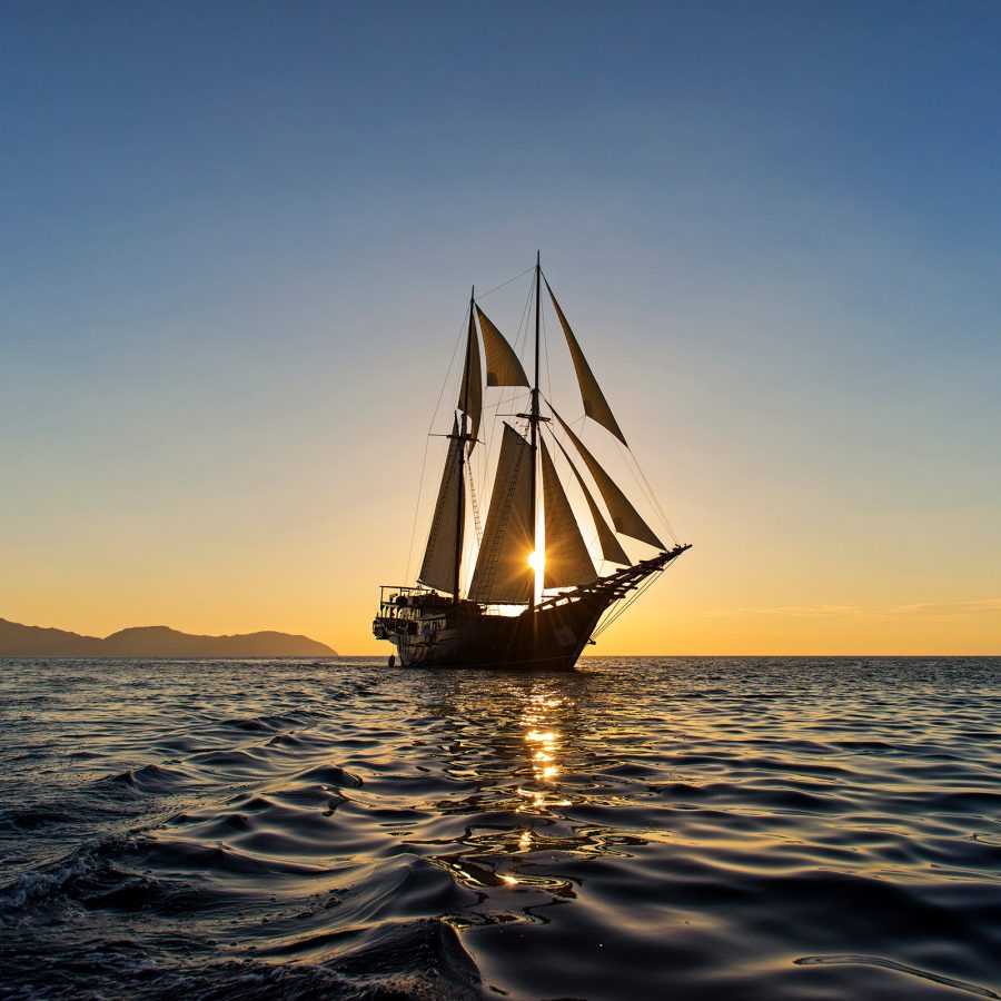 The Amandira sailing at dusk.