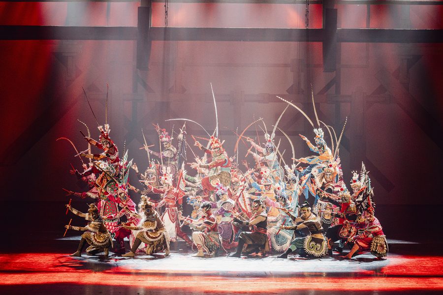 Costumed performers posing onstage in Odes to Heroes.