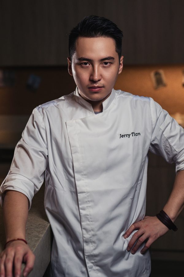 Chef Jerry Tian in a white chef coat. 
