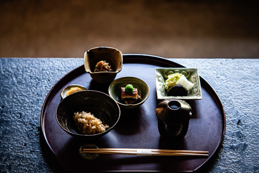 A tray with various plates of Japanese food at Shokutei Nihonryori.