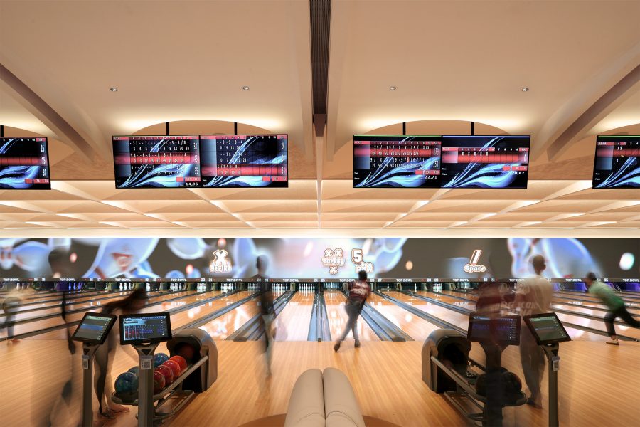 People bowling at Top Bowl in Kai Tak Mall, Hong Kong. 