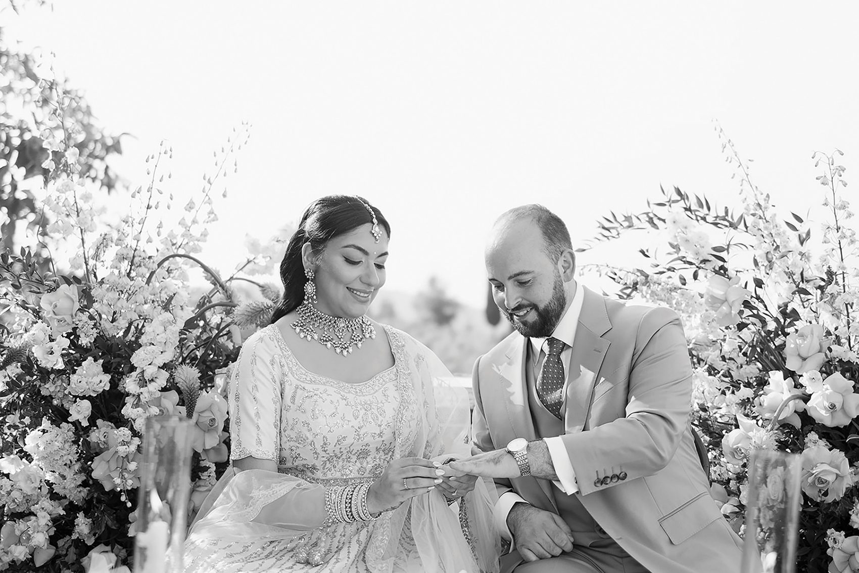 Indian bride exchanging rings with her husband