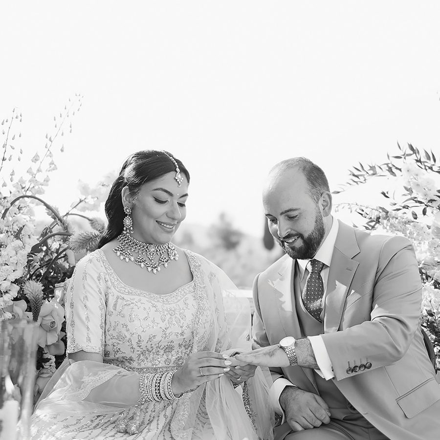 Indian bride exchanging rings with her husband