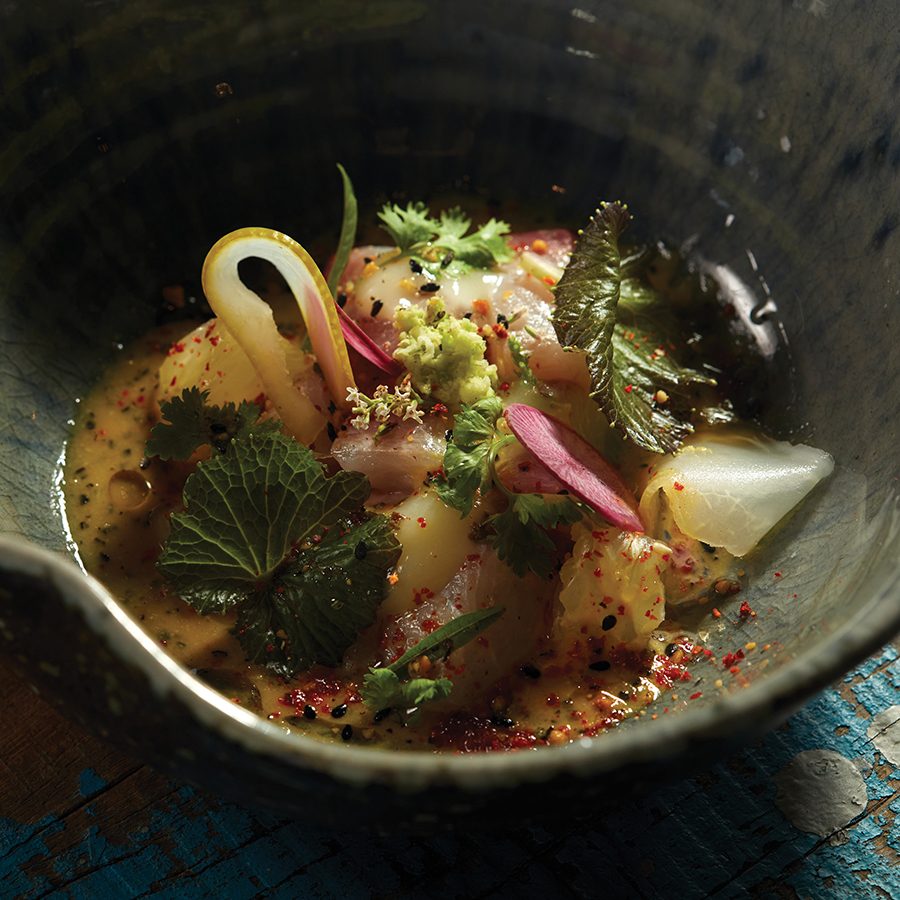 A well-seasoned veggie dish topped with wasabi at Si Dining, Da Nang. 