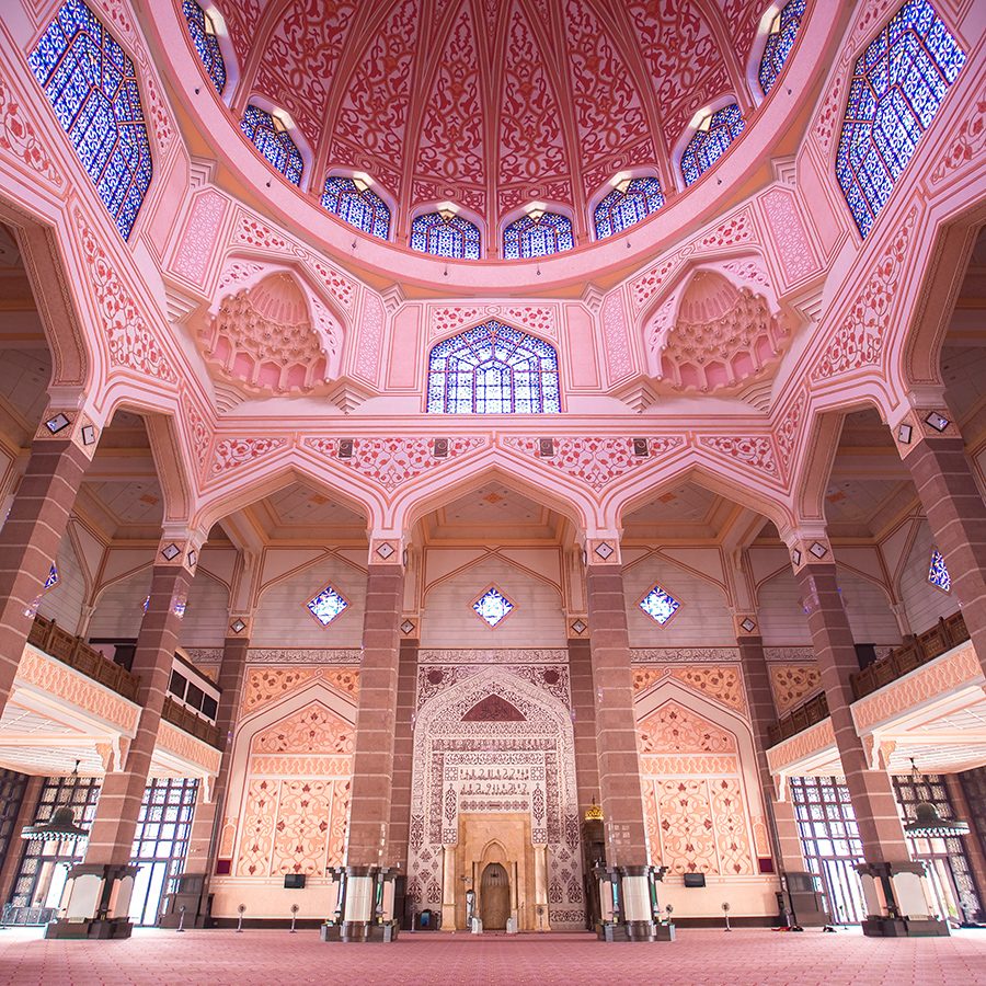 A view of the pink interiors of Masjid Putra pink mosque in Putrajaya, Malaysia.
