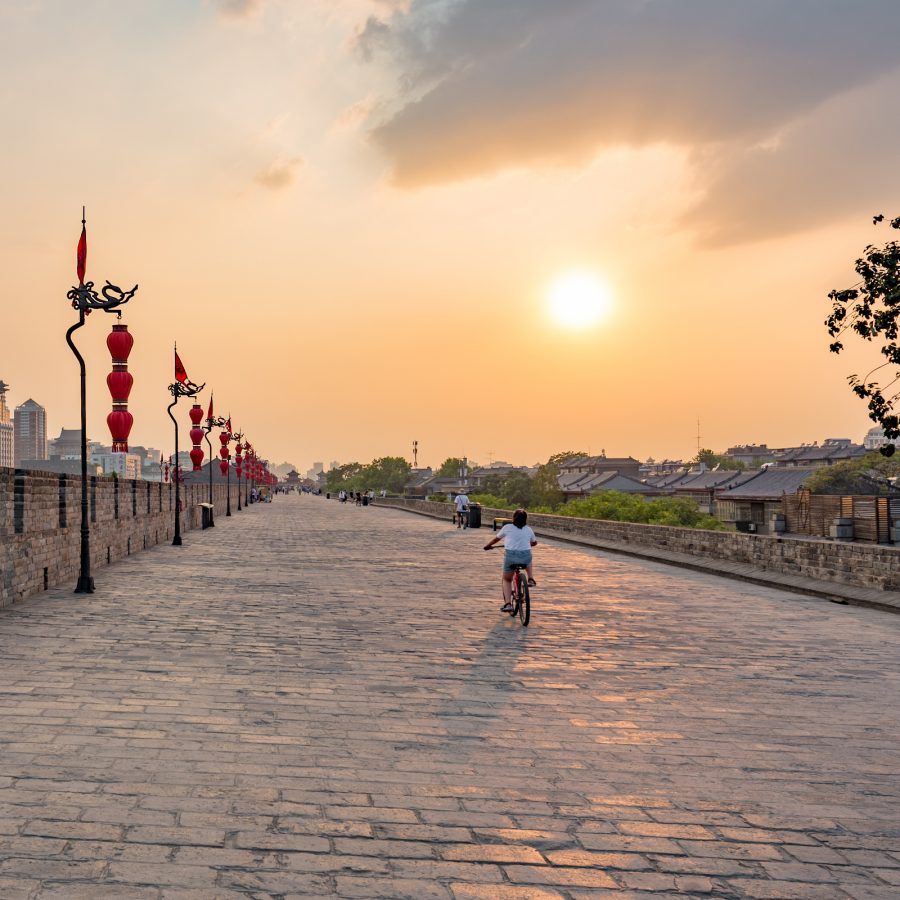 A person cycling on the Xi'an City Wall.