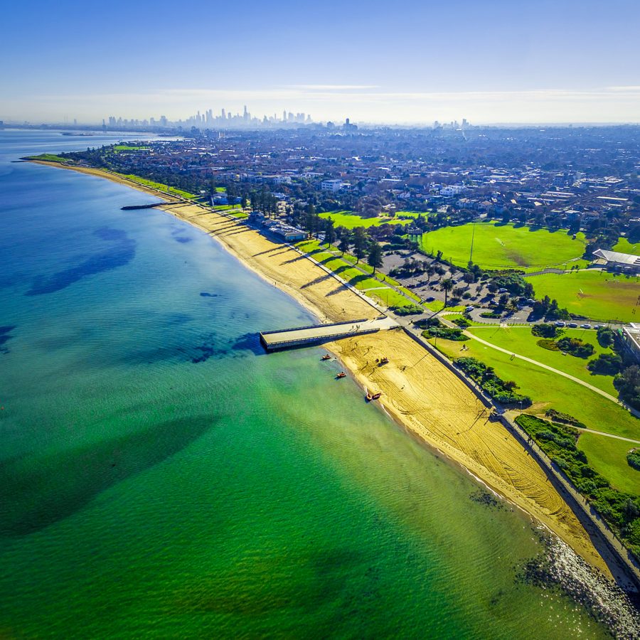 A wide shot of Point Ormond, with cyclists on the bike path. 
