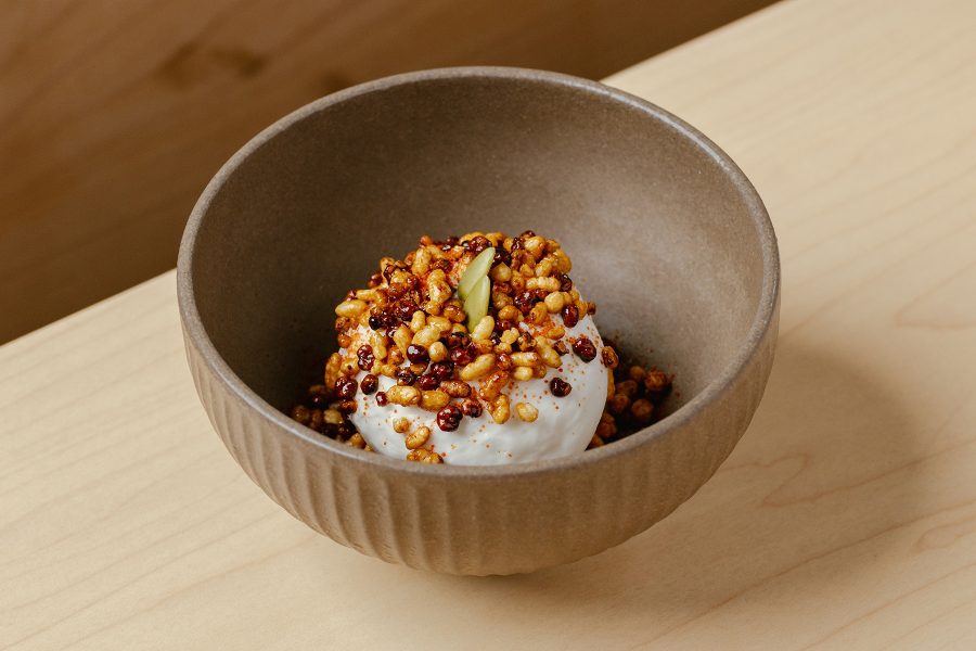 Close up shot of a dish at Hansik Goo plated in an earthenware bowl