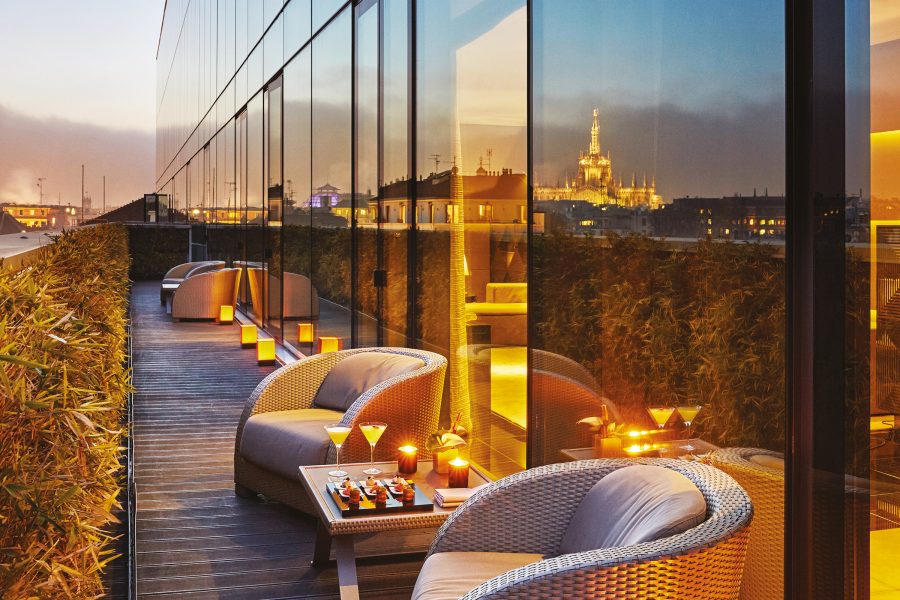 Outdoor lounge at Armani Hotel Milano at sunset