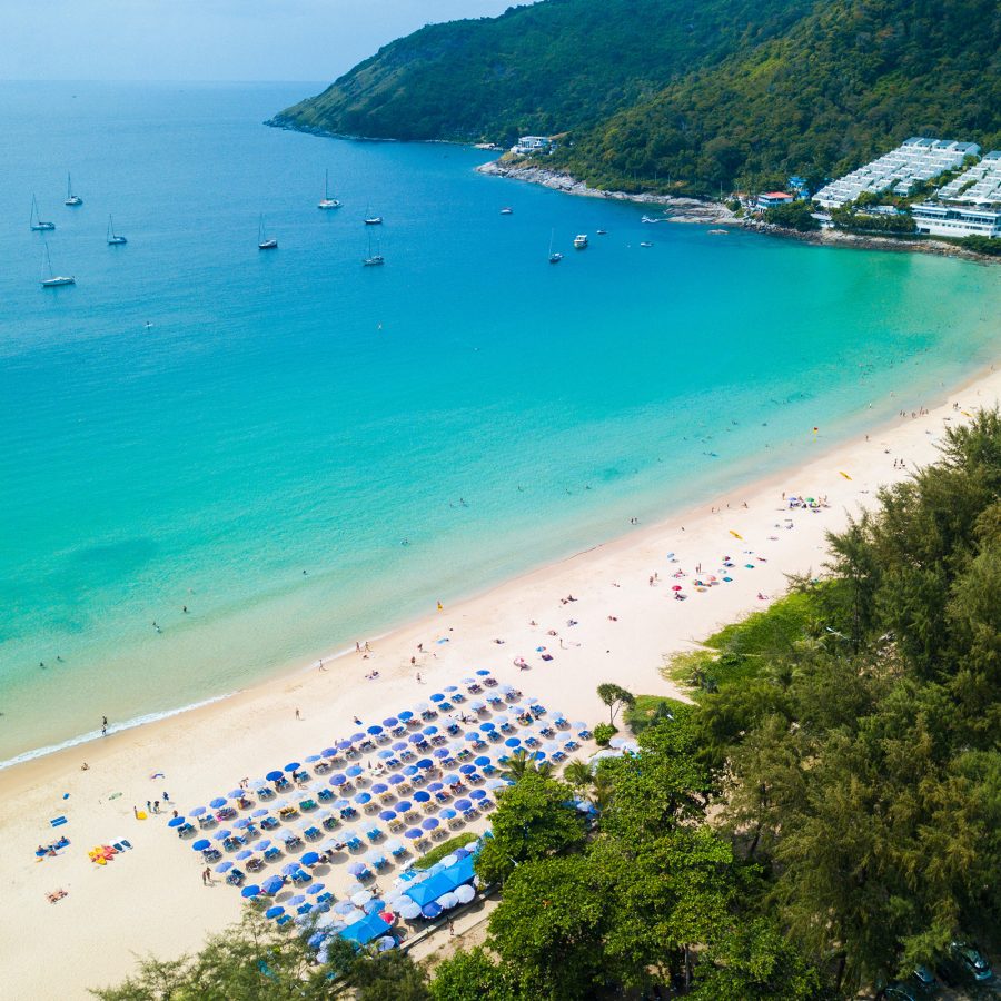 Aerial view of Nai Harn Beach in the daytime, near Rawai in Phuket. 