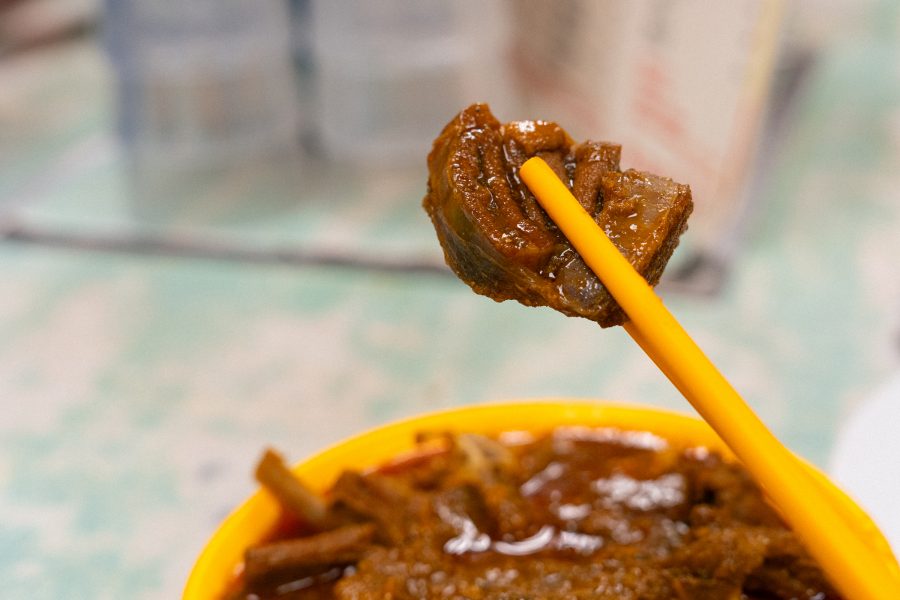 A close up of a piece of mutton curry served at Wai Kee halal duck restaurant Bowrington Road Market and Cooked Food Centre, Wan Chai.
