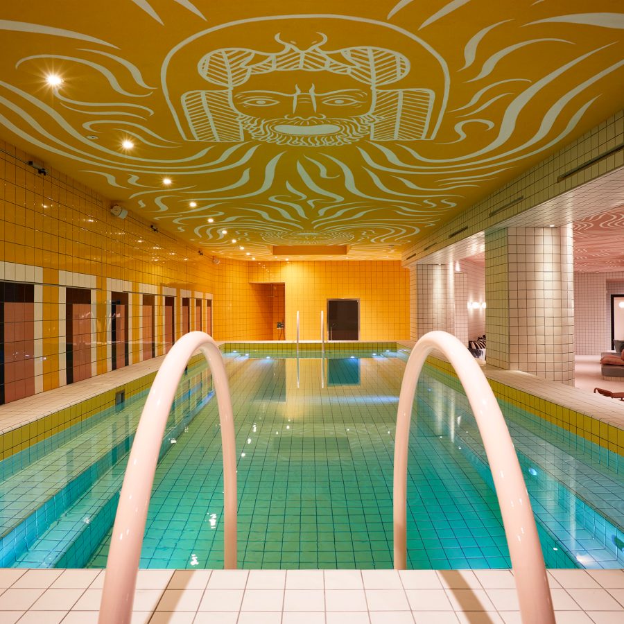 An interior view of the indoor swimming pool at Mama Shelter hotel in Prati, Rome.